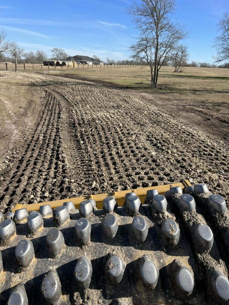 machine clearing up land closeup