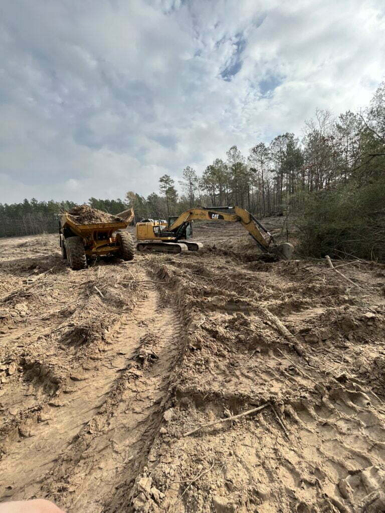 two CAT machines working on digging