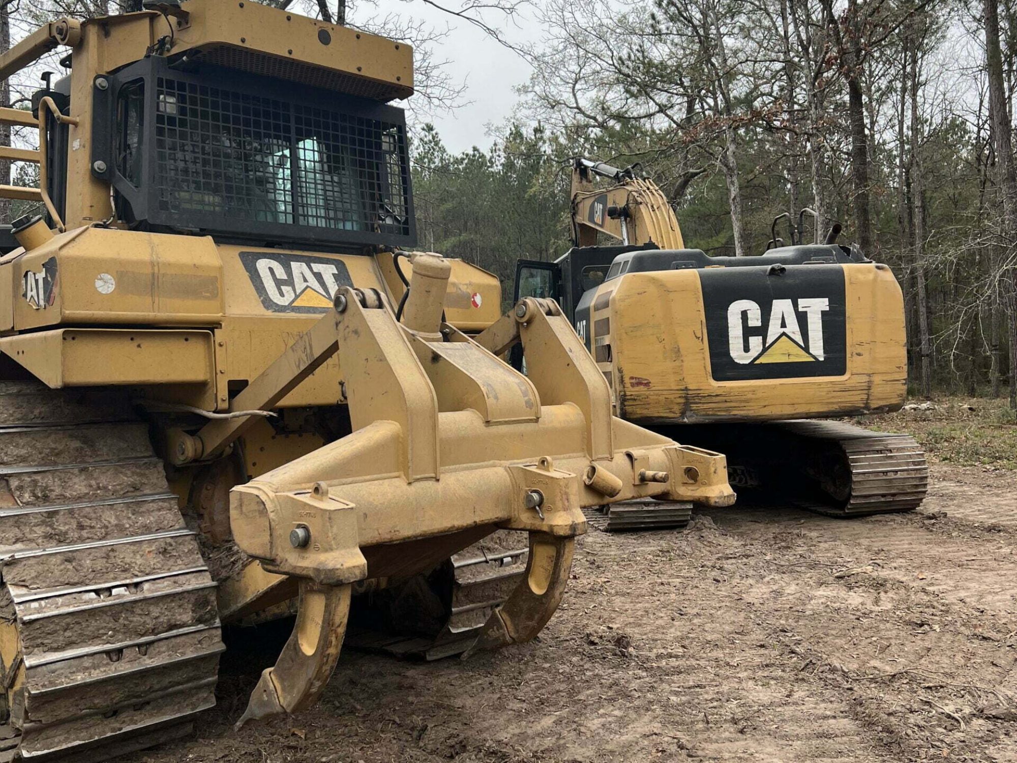 yellow machine clearing land